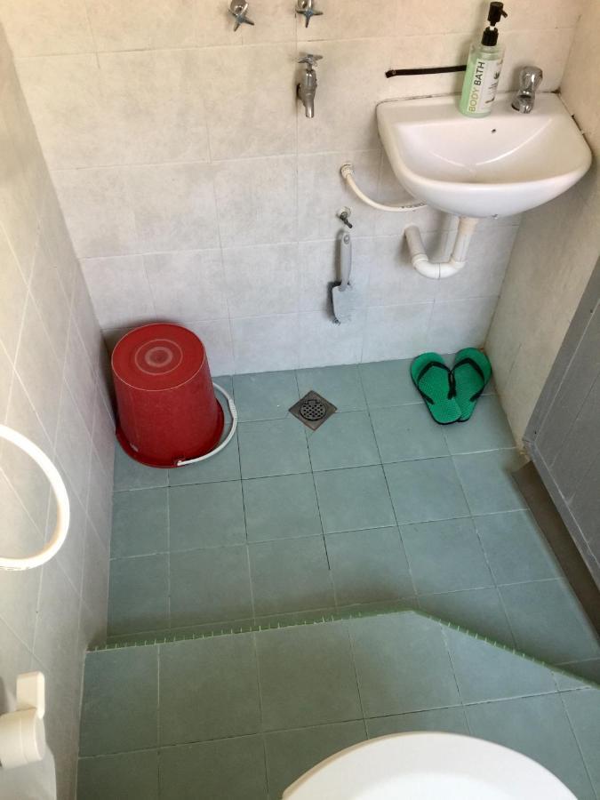 Pesona Backpackers Inn كوتا بْهارو المظهر الخارجي الصورة