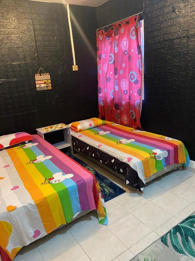 Pesona Backpackers Inn كوتا بْهارو المظهر الخارجي الصورة