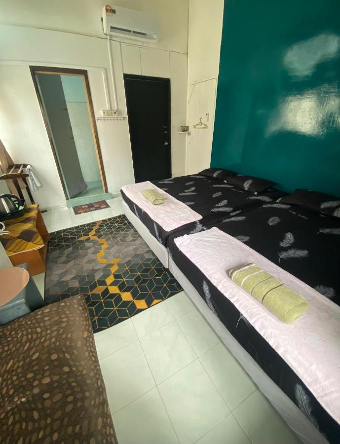 Pesona Backpackers Inn كوتا بْهارو المظهر الخارجي الصورة