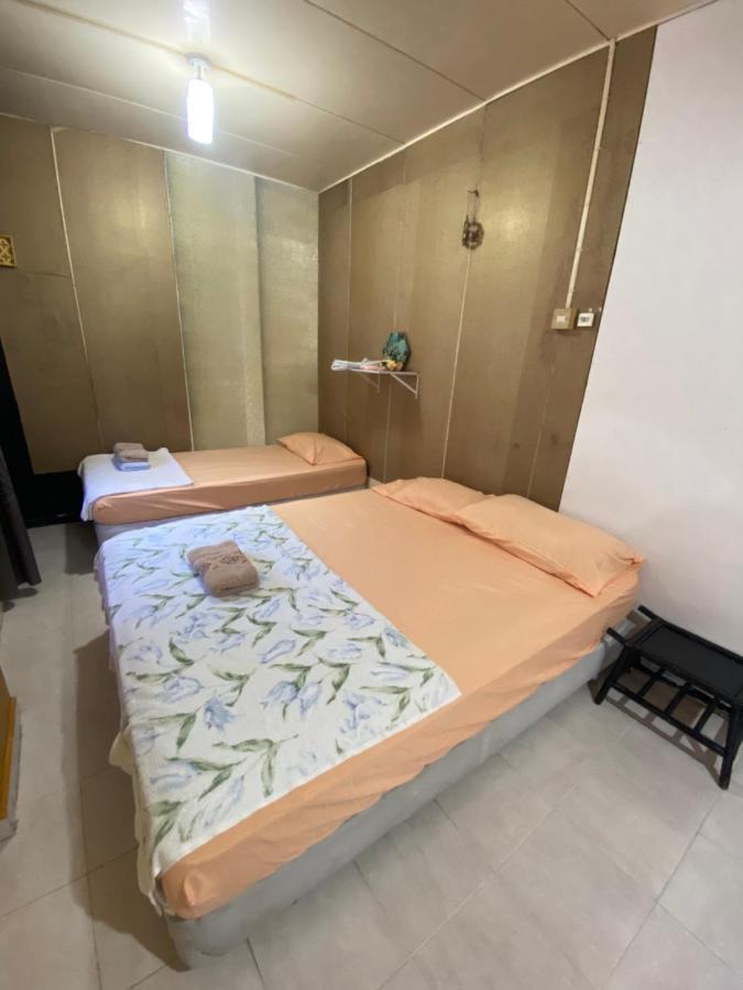 Pesona Backpackers Inn كوتا بْهارو المظهر الخارجي الصورة