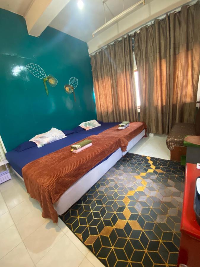 Pesona Backpackers Inn كوتا بْهارو المظهر الخارجي الصورة